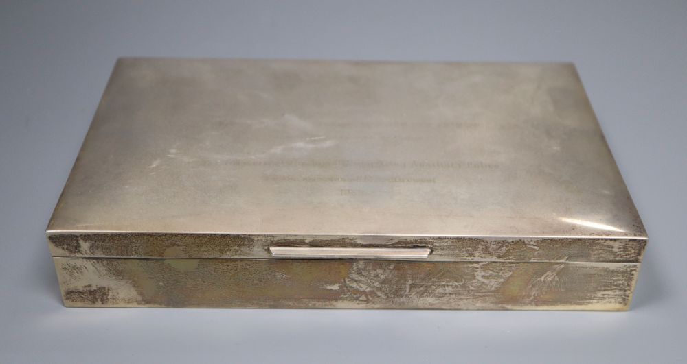 Two silver cigarette boxes, a silver cigarette case and Thai white metal cigarette box, largest 18.7cm.